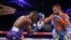 Lomachenko y Rigondeaux en acción en el ring. 