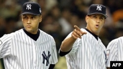 Derek Jeter y Alex Rodriguez.