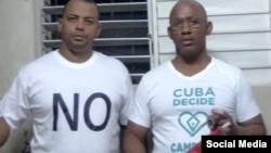 Los activistas de derechos humanos Yoel Parsons (izquierda) y Maykel Herrera Bones (derecha).