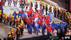 El luchador cubano Mijain Núñez lidera la delegación de Cuba en la ceremonia de inauguración de los Juegos Olímpicos Río 2016 hoy, viernes 5 de agosto de 2016, en el estadio Maracaná de Río de Janeiro (Brasil). EFE/José Méndez