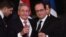 Brindis en el Palacion del Elíseo entre Raúl Castro y Francois Hollande.